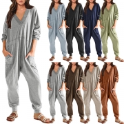 Casual jumpsuit med ensfärgad V-ringad design, långärmad och lösa patchfickor.