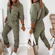 Mode enfärgad långärmad jumpsuit med hög midja och polokrage