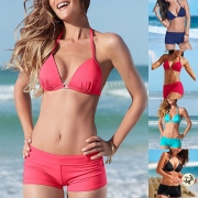 Bikiniset i enfärgad design med halterneck och låg midja