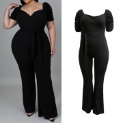 Jumpsuit dam – enfärgad V-ringad med knyt i midjan, vida ben och oversize-passform