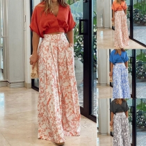 Fashion Tvådelat Set med enfärgad Crop Top och vida blommiga Byxor
