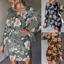 Bodyconklänning med tryckt blommönster, långärmad med O-ringad urringning och självknytande midja