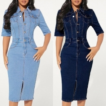 Gammaltvättad jeansklänning med ståkrage och knäppt slits samt armbågslång ärm