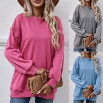 Casual långärmad tröja i enfärgad stil med rund hals
