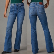 Avslappnade jeans i rak passform med fransade och tvättade detaljer