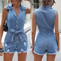 ModeGammaltvättad ståkrage med knäppning. Självknytande Frayed Denim Romper