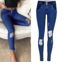 Mode nödställda skinny-jeans med låg höjd rumpa för yoga och träning