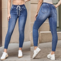 Mode: Gammaltvättade skinny jeans med dragkedja i midjan