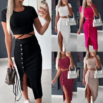 Mode sett i två delar med Crop Top och Knäppningskjol