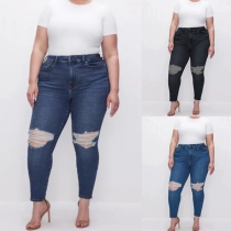 Mode gammaltvättade jeans med distresseeffekt