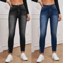 Mode gammaltvättade skinny jeans med knapp