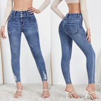 Gammaltvättade distressed hög midja smala jeans