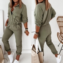 Mode enfärgad långärmad jumpsuit med hög midja och polokrage