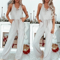 Casual ärmlös jumpsuit med knäppning framtill