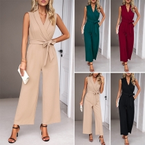 Elegant jumpsuit with wide-legged trousers, self-tie waistband and V-neck.
