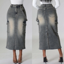 Street Fashion jeanskjolar med sidolappade fickor och bakslits, i gammaldags tvätt.