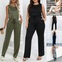 Mode enfärgad rund hals ärmlös midja jumpsuit med dragsko