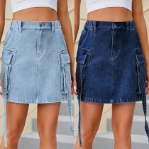 Äldre denimkjol med sidosnäckfickor