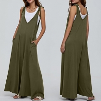 V-ringad Sidofickor vid benen Löst Jumpsuit