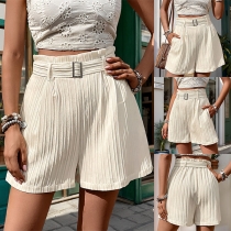 Casual plisserade shorts med bälte i high-rise-stil
