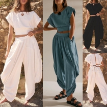 Streetwear tvådelat set med knytbar Crop Top och lösa byxor