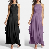 Elegant pärlbeströdd Halterneck ärmlös midjekramande chiffongklänning