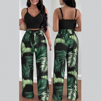 Mode tvådelade set med smocked Crop Top och raka byxor