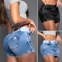Mode med dragsko i midjan Gammalt tvättade shortsjeans