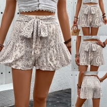 Mode blommiga mönstrade självknutna rosettshorts