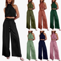 Trendig enfärgad tvådelad set bestående av Crop Top och raka byxor