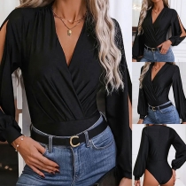 Modern enfärgad V-ringad långärmad bodysuit med slits