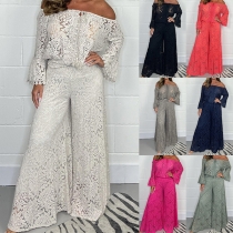 Fashionabla tvådelade spetskläder. Setet består av skjorta och byxor med vida ben