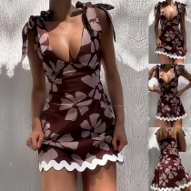 Moderiktig blommig tryckt med självknuten axelrem och V-ringning Bodycon klänning