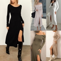 Elegant enfärgad rund hals långärmad midiklänning med slits
