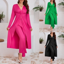 Modern enfärgad tvådelad outfit med slitsad skjorta och byxor