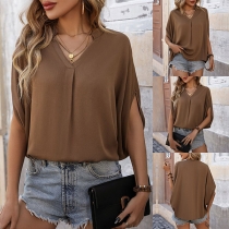Modern enfärgad V-ringad Batwing-ärmad blus