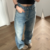 Gatumodeknapp Höghus vintage tvättade jeansbyxor med rak skärning
