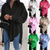 Elegant enfärgad V-ringad långärmad blus med sidoslits