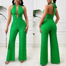 Moderiktig Halterneck Rygglös Jumpsuit med Vida Ben