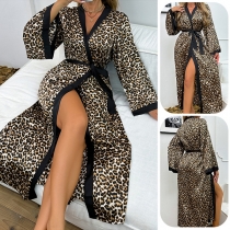Snygg leopardmönstrad rock med skärp och långa ärmar för kvinnor