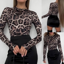 Långärmad bodysuit med leopardmönster och rund hals