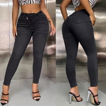 Oregelbunden midja Vintage-tvättade skinny jeans i denim