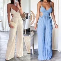 V-ringad Backless Cami Jumpsuit i Modestruktur med Vida Ben