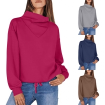 Draperad moderiktig långärmad topp
