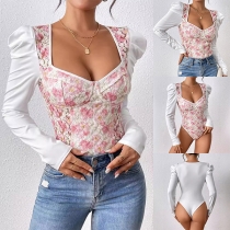Blommig broderad body med sweetheart-urringning och långa puffärmar