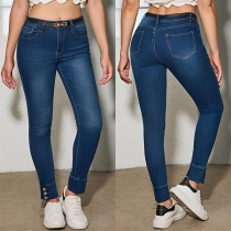 Mellanhöga skinny jeans med sidoknappar
