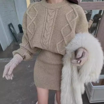 Elegant tröja med kabelmönster och rund hals, långärmad