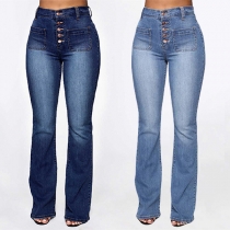Modeknapp Höga lappfickor Raka vintage-tvättade jeans