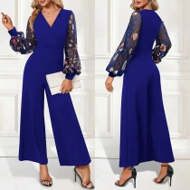 Blommig Broderad Jumpsuit i Gasväv med V-ringning och Vida Ben