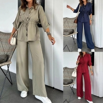 Tvådelat modeset med dragsko-midjeskjorta och raka byxor